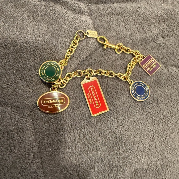 Coach Accessories - Coach Gold Hangtag Charm Bracelet Bag Charm Extender